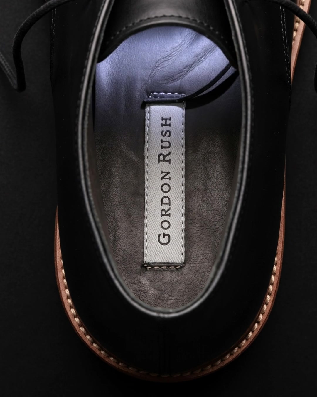 The Gordon Rush footbed label inside a finished shoe