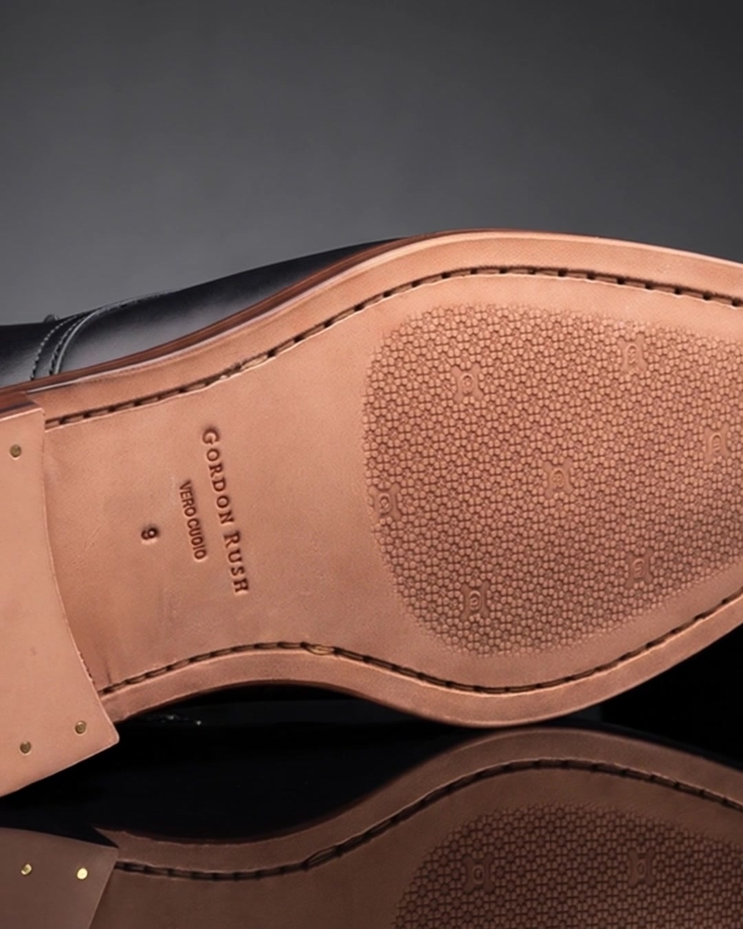 The stamped leather outsole of a finished boot