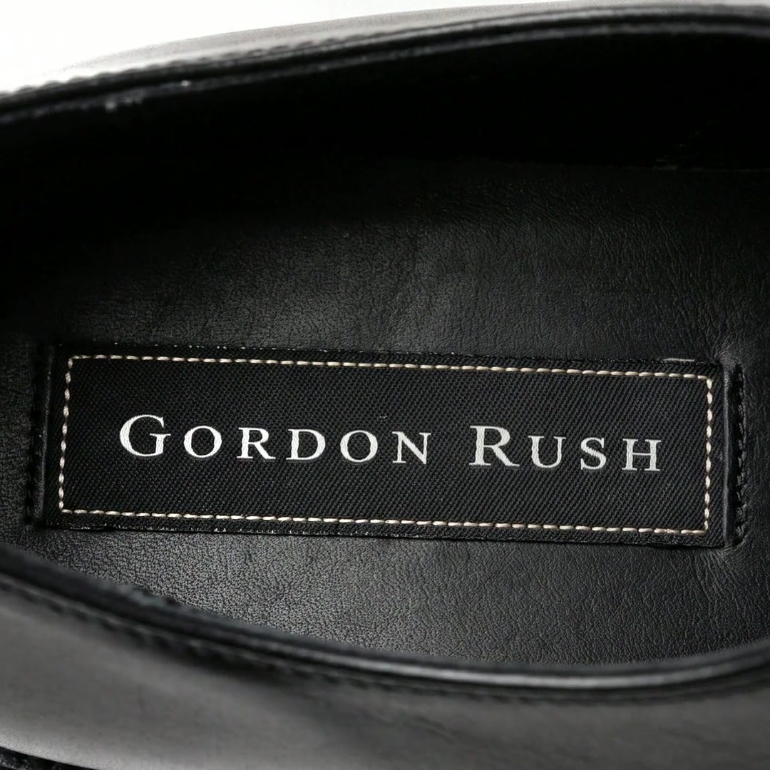The Gordon Rush woven label inside a finished shoe